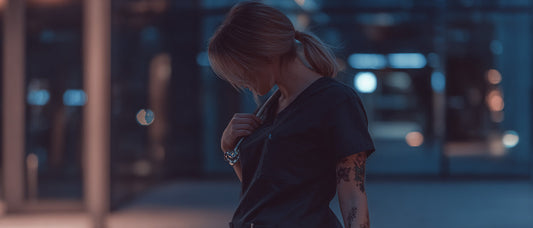 emotionally intelligent nurse in hospital corridor at night