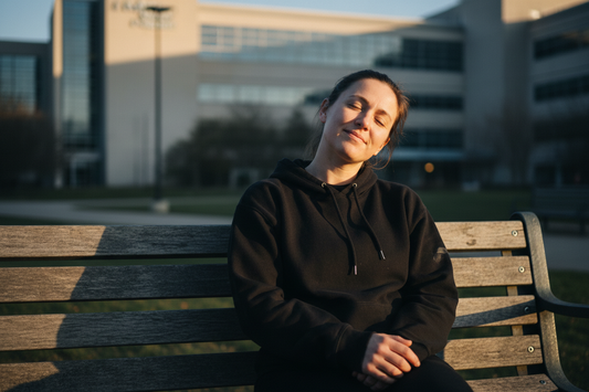 nurse wearing black hoodie and relaxed clothing after long hospital shift