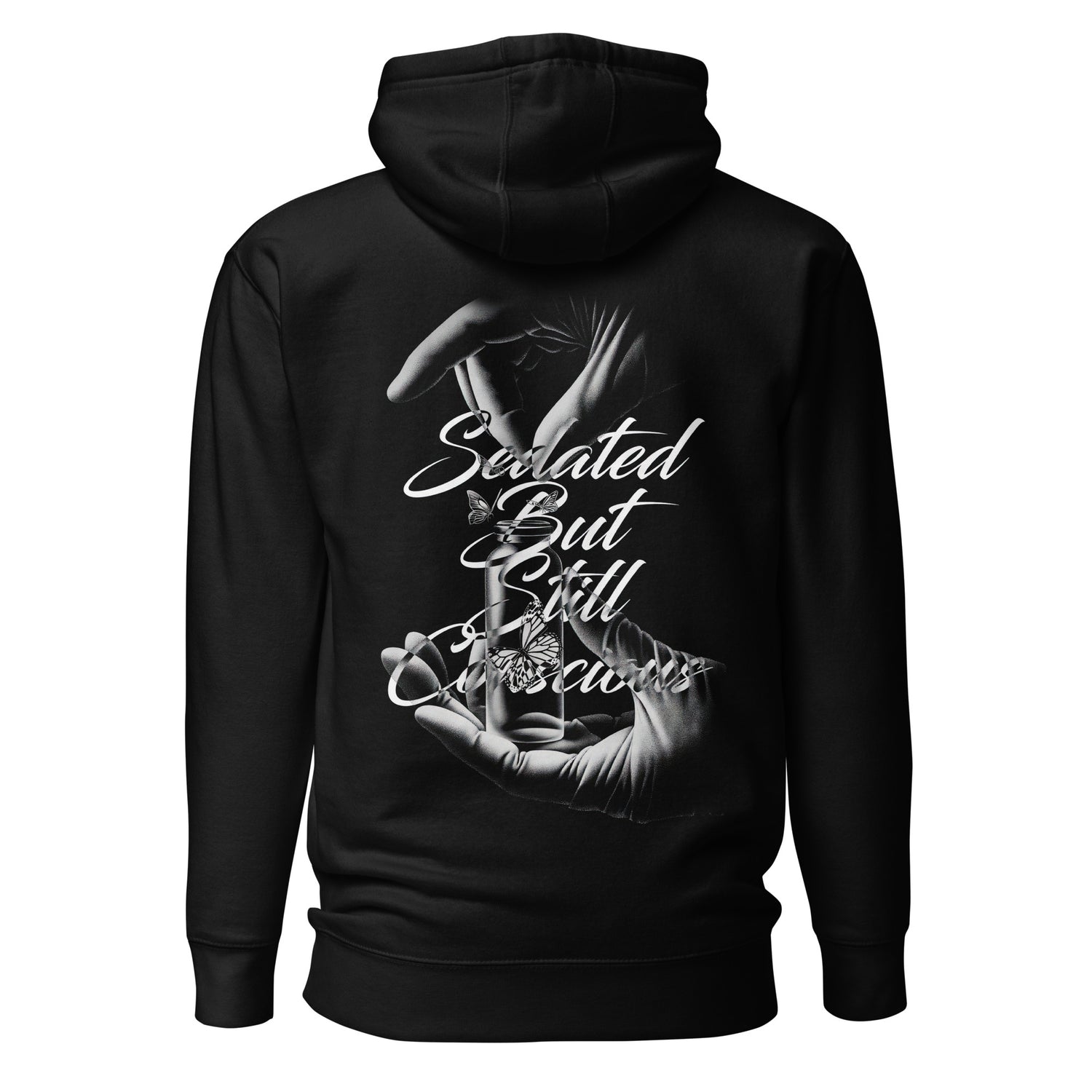 Gloved hands releasing a butterfly in a vial – symbolic black-and-white design on hoodie for alt nurses.